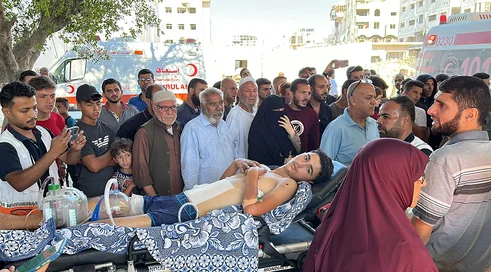 patients-and-caregivers-were-transferred-from-Kamal-Adwan-in-North-Gaza-to-Al-Shifa-Hospital-in-Gaza